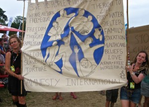 Painting banners for Amnesty at WOMAD festival